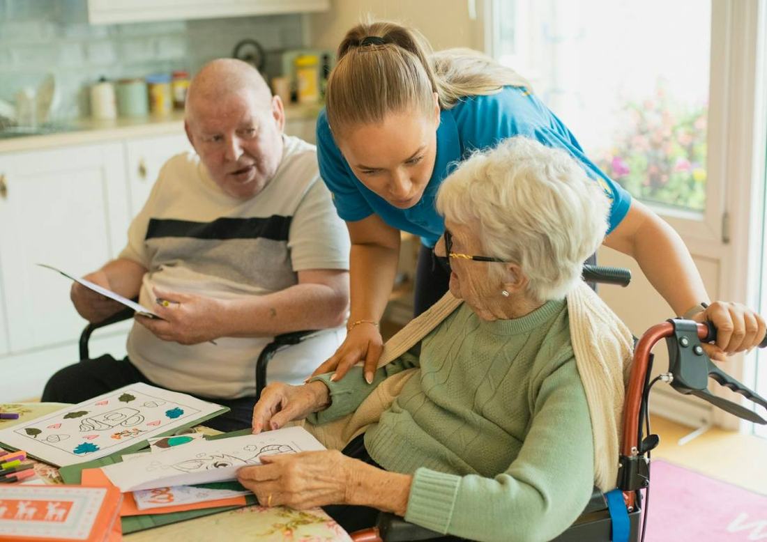Care worker with residents